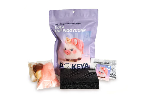 Lola the Piggycorn needle felting kit with felt, felting pad, needles, template, and card with link to full video instructions